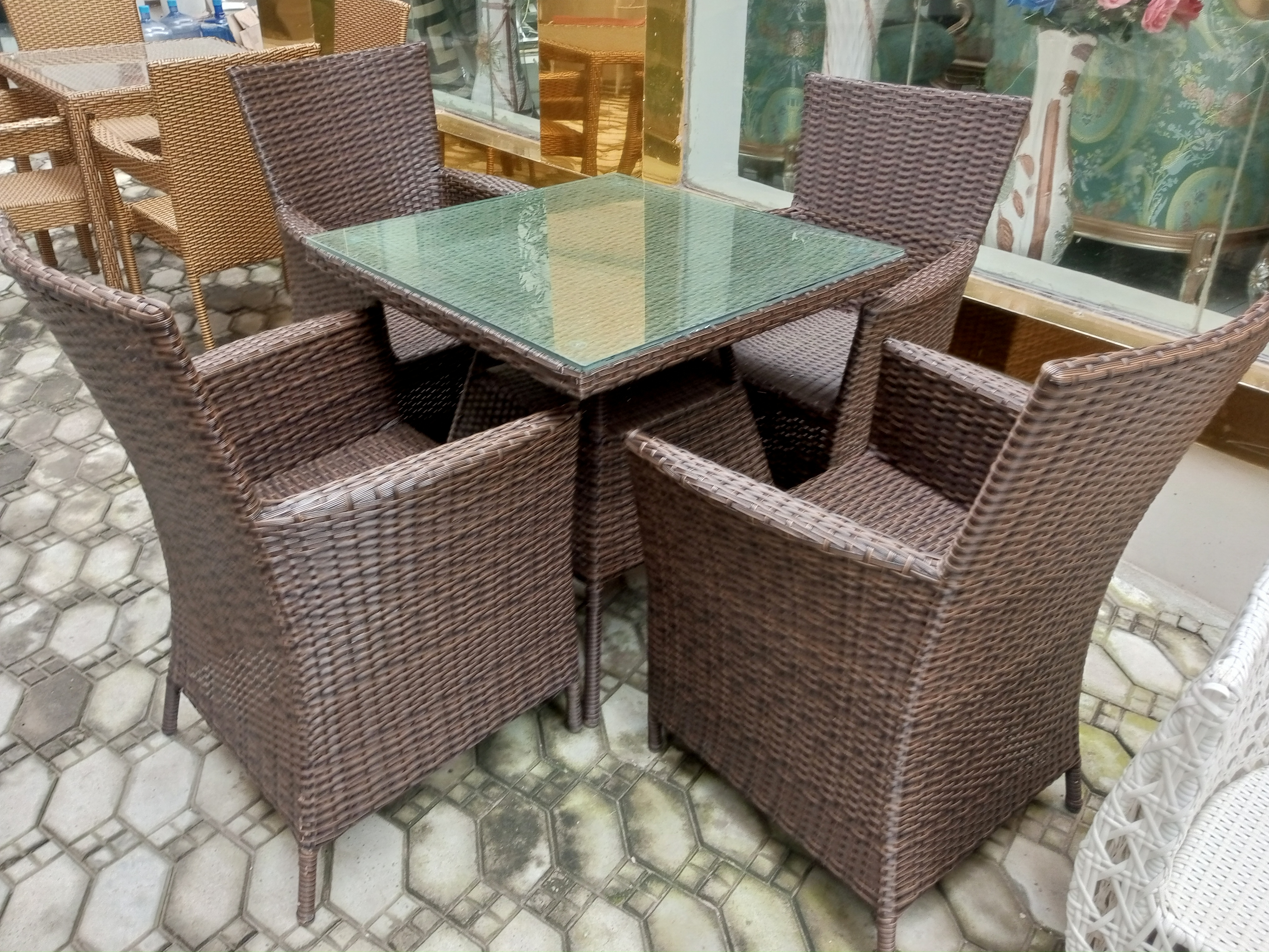 High-Quality Rattan 4-Chair and Glass Top Table Set
